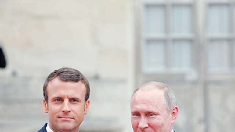 «Вікно у Європу»: карикатурист висміяв зустріч Путіна з Еммануелем Макроном
