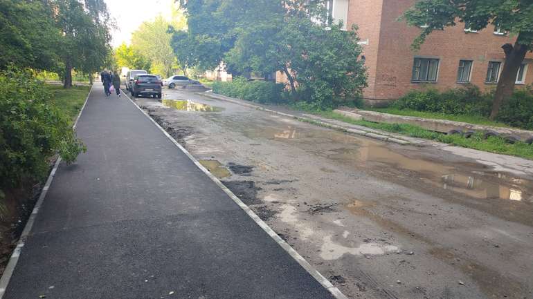 Дощ випробовує на міцність нові тротуари Полтави