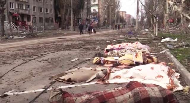 Вбиті московитами маріупольці на вулицях міста (23.04.2022)