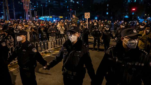 Акції китайських компаній впали після антикарантинних протестів_1