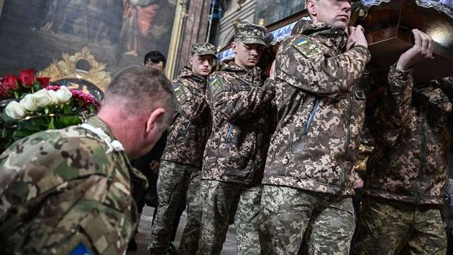 У Польщі попрощалися з воїном, який боровся за Україну_8