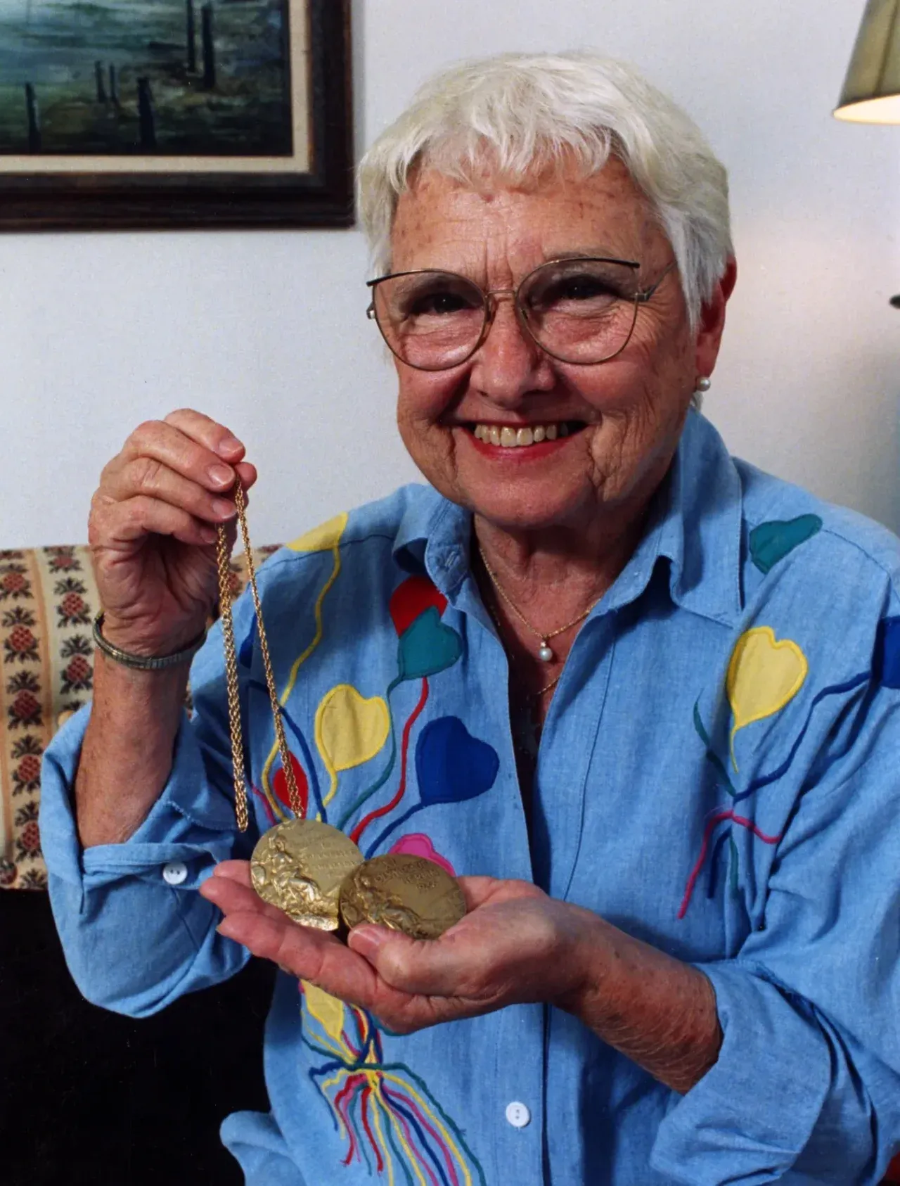 Елізабет Робінсон та її дві золоті олімпійські медалі